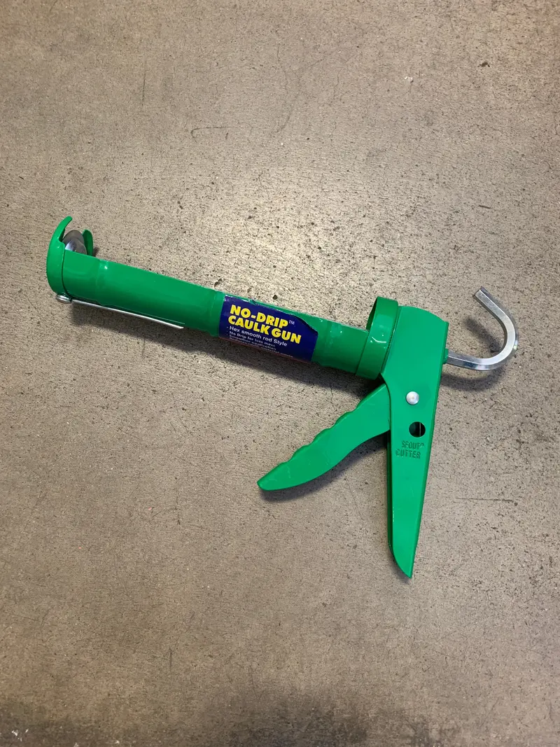 Half-Barrel Caulking Gun For Smooth Adhesive Application 1
